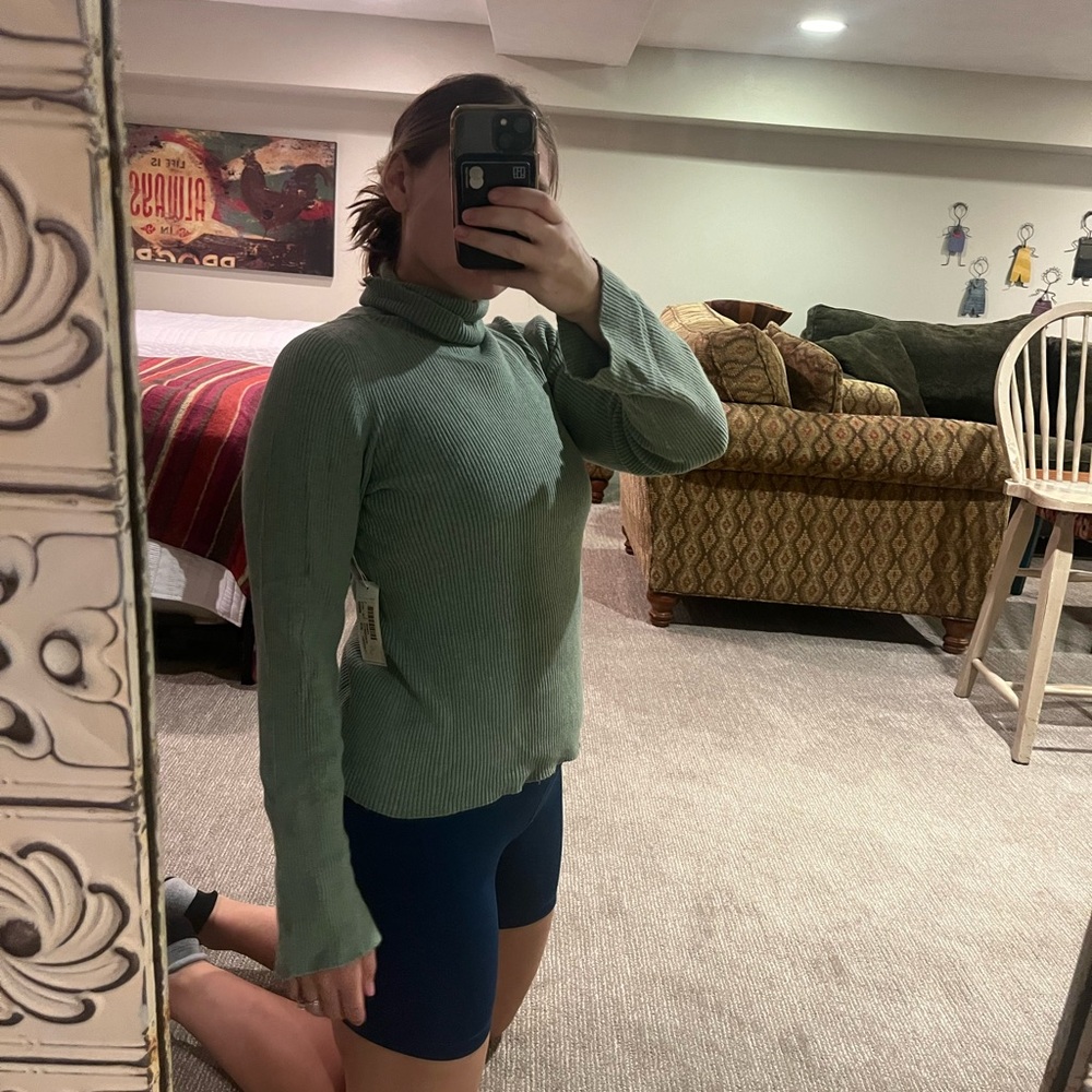 Soft turtleneck sweater by Margaret O Leary